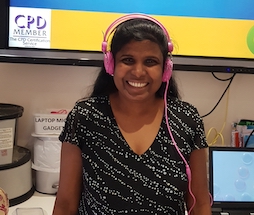 woman at computer smiling