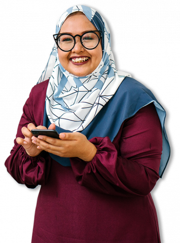 Smiling lady wearing a headscarf and glasses, using a mobile phone