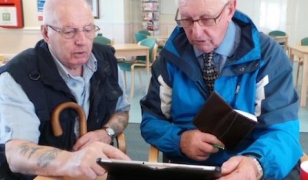 two chaps looking at a screen
