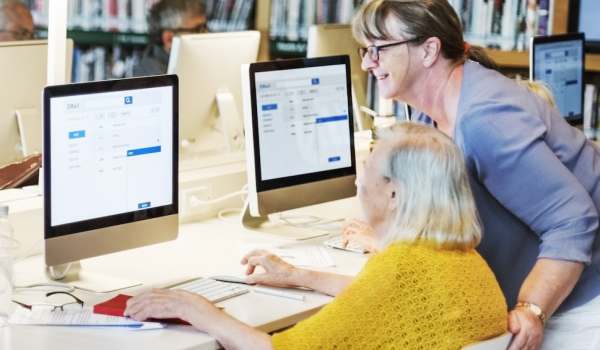 woman at drop in session in a library