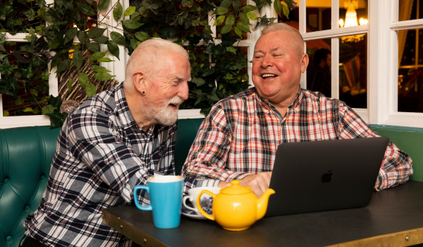 two men laughing
