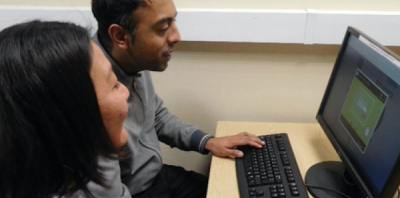 couple looking at computer