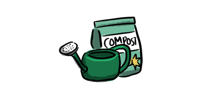 A watering can and compost