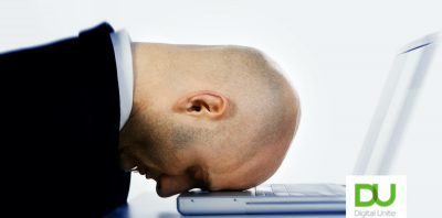 man head on laptop