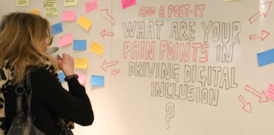 woman looking at a white board