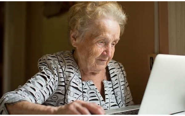 Picture of older person using the computer
