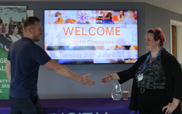 welcome sign and hand shake