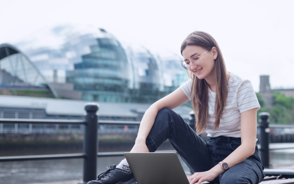 woman looking at computer