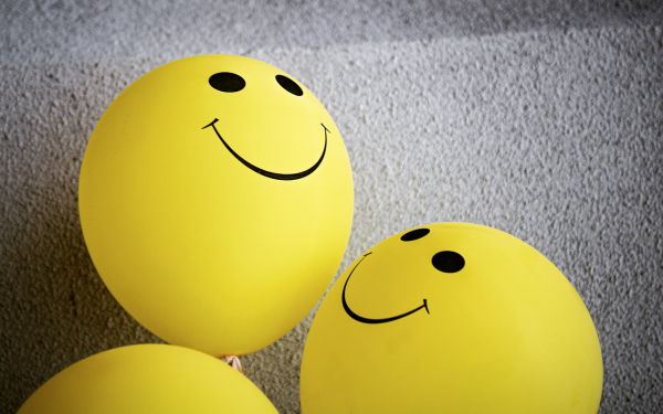 balloons with smiles on them. 