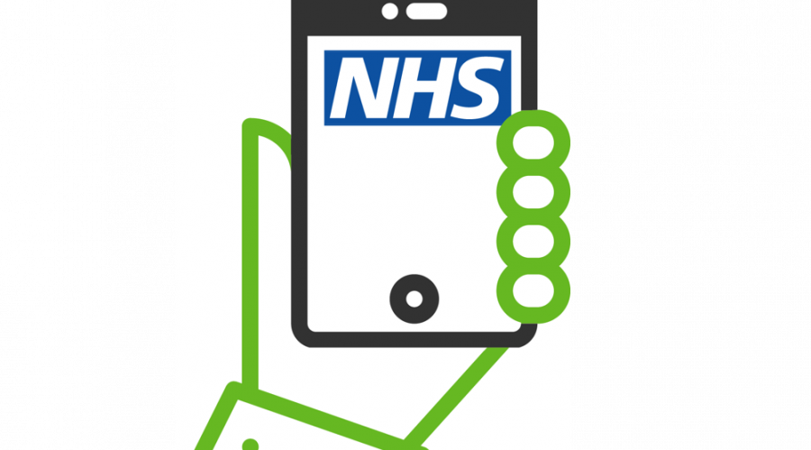 hand holding phone with NHS logo on it
