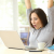 cheering lady at a computer